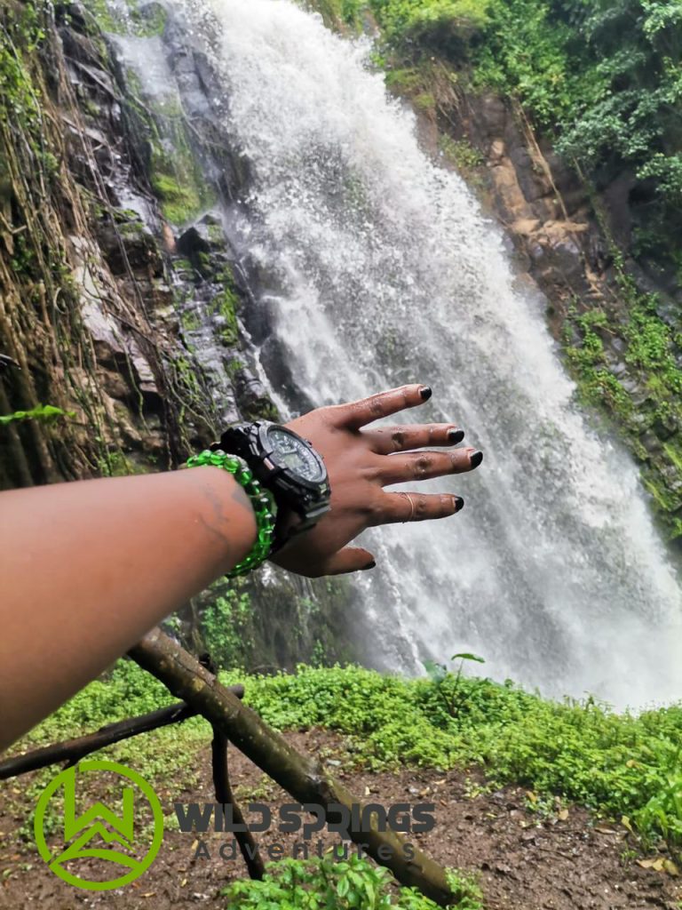 sightseeing beside the waterfall