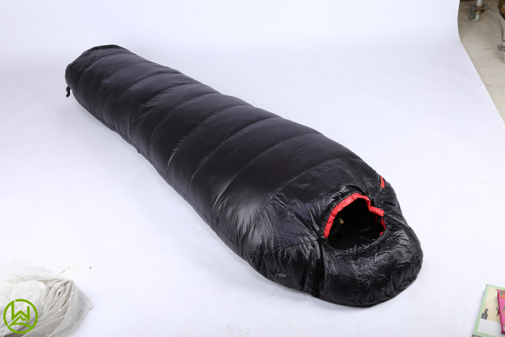 an image of a black down camping bag
